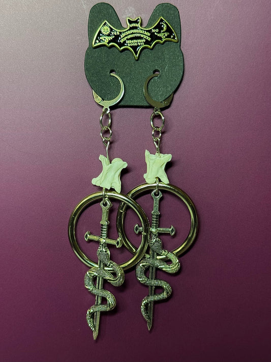 Serpent daggers w/ rattlesnake vertebrae