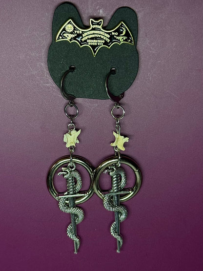 Serpent daggers w/ rattlesnake vertebrae
