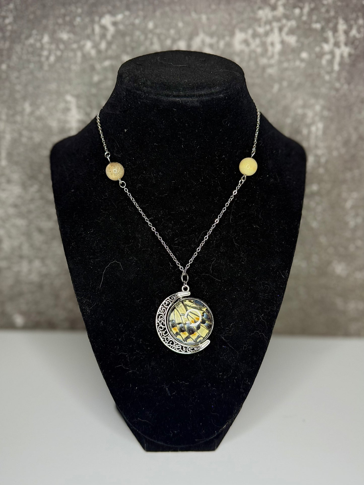 Rotating Moon W/ Butterfly Wings